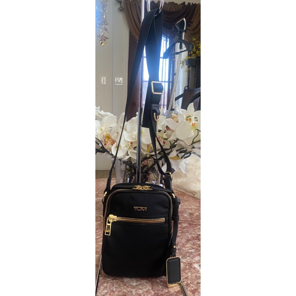 New Tumi Voyageur Persia Black Gold Crossbody Bag, $195